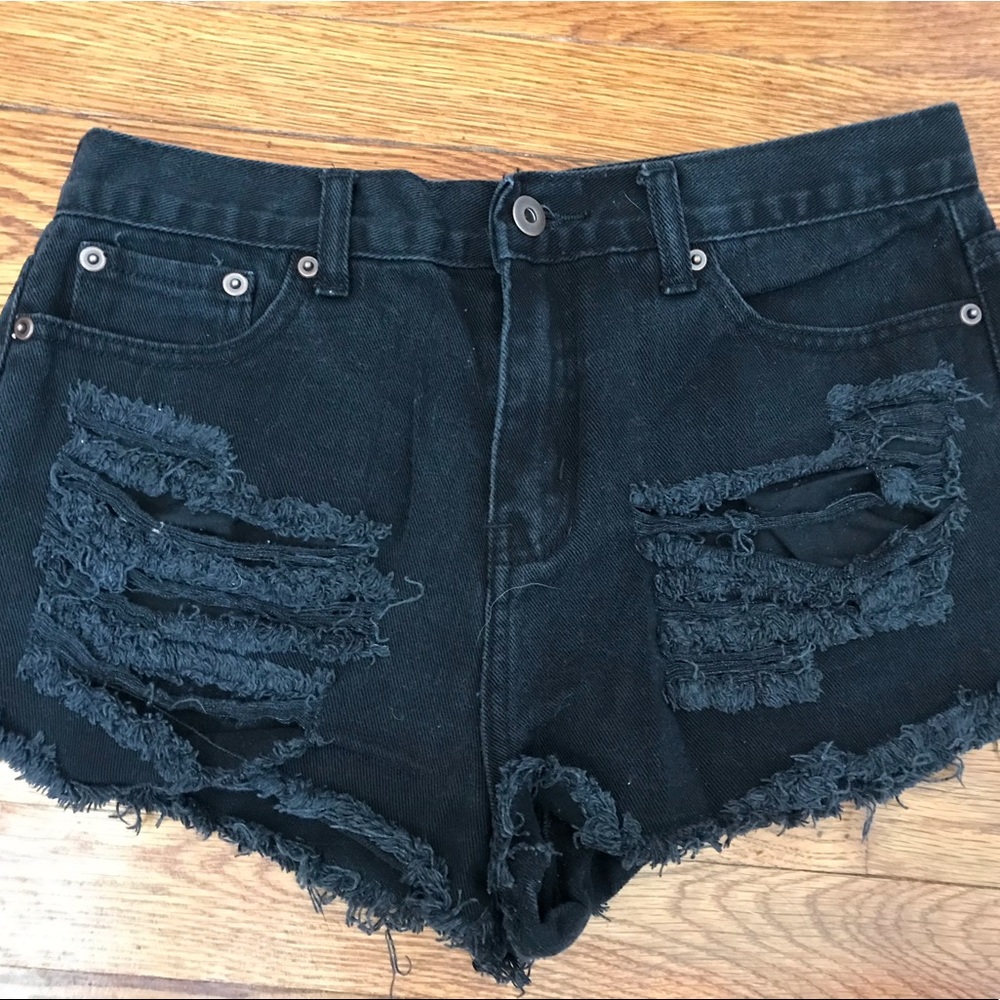 Black ripped shorts